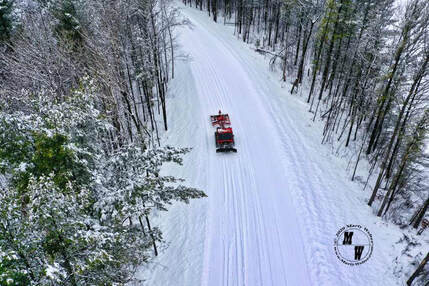 LMC out on the trail grooming